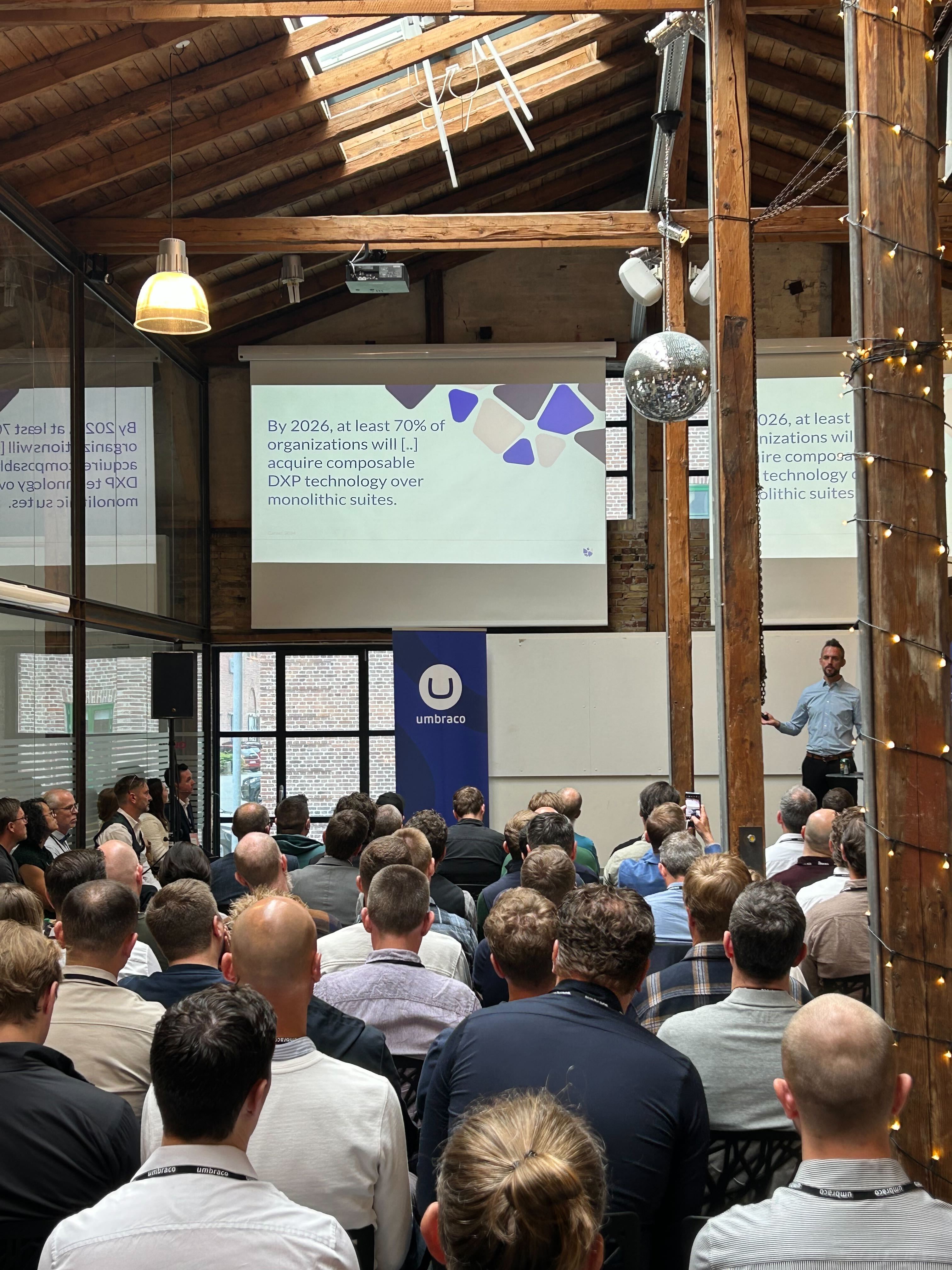 Filip, CTO of Umbraco, delivering a talk at the business summit.